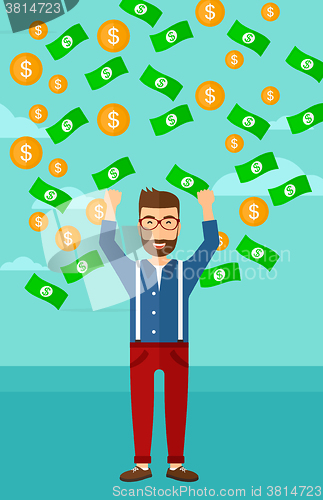 Image of Happy man with  flying money. 