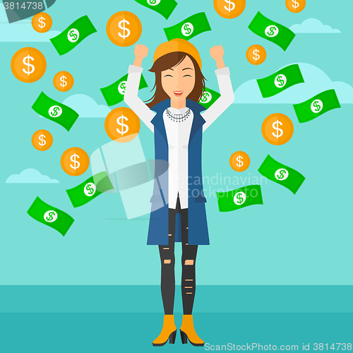 Image of Happy woman with  flying money. 