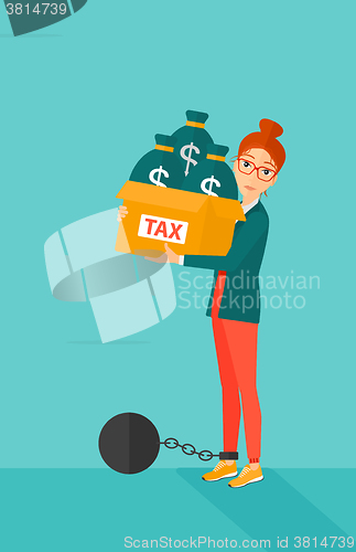 Image of Chained woman with bags full of taxes. 