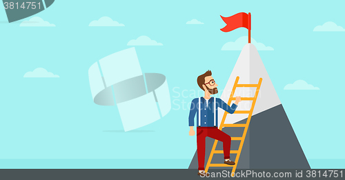 Image of Man climbing on mountain.