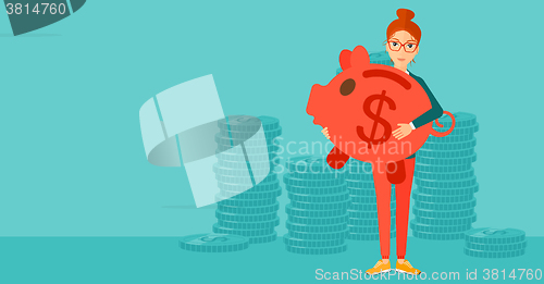 Image of Woman carrying piggy bank.