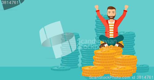 Image of  Happy businessman sitting on coins.