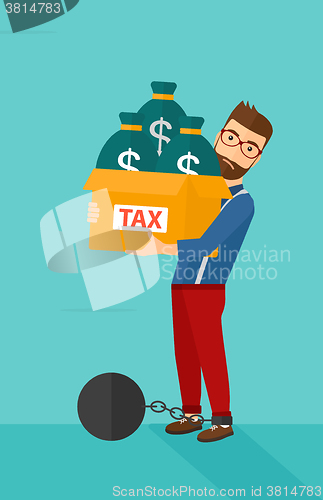 Image of Chained man with bags full of taxes. 