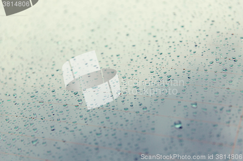 Image of close up of wet rear car glass