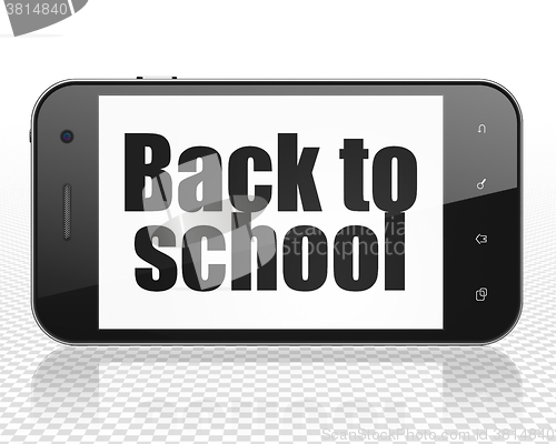 Image of Education concept: Smartphone with Back to School on display