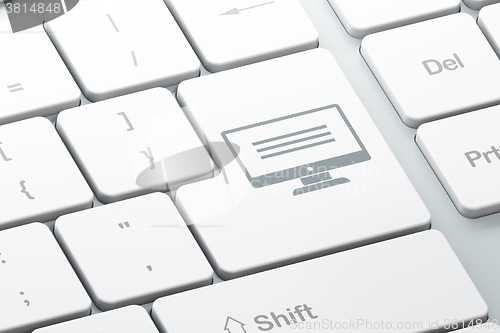 Image of Web development concept: Monitor on computer keyboard background