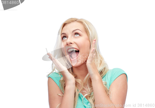 Image of surprised smiling young woman or teenage girl