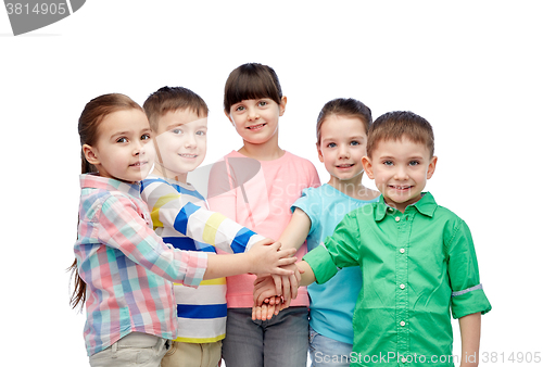 Image of happy little children with hands on top