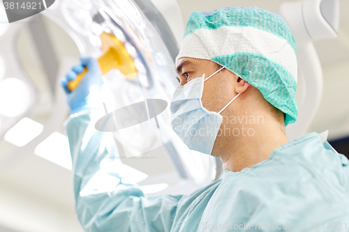 Image of surgeon in operating room at hospital