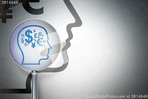 Image of Studying concept:  Head With Finance Symbol with optical glass on digital background