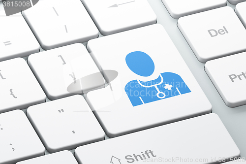Image of Medicine concept: Doctor on computer keyboard background