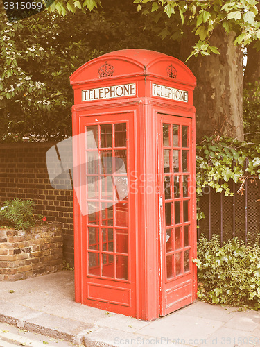 Image of Retro looking Red phone box in London