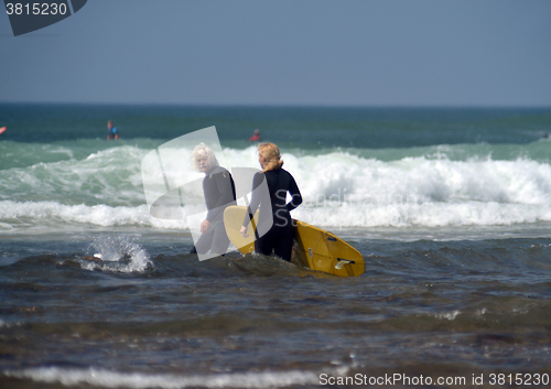 Image of editorial couple surfers Ditch Plains Montuak New York