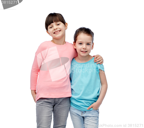 Image of happy smiling little girls hugging
