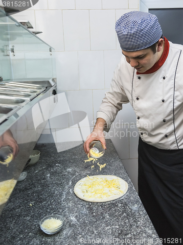 Image of Chef Cooking Pizza