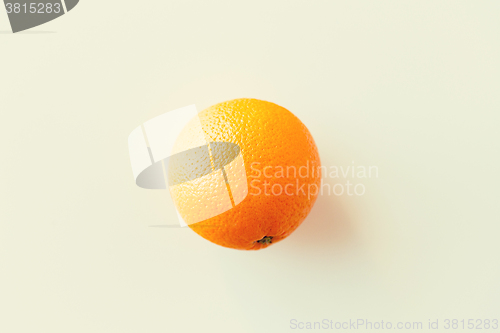 Image of ripe orange over white