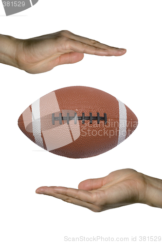 Image of Holding the Football