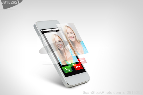 Image of close up of smarthphone with incoming call