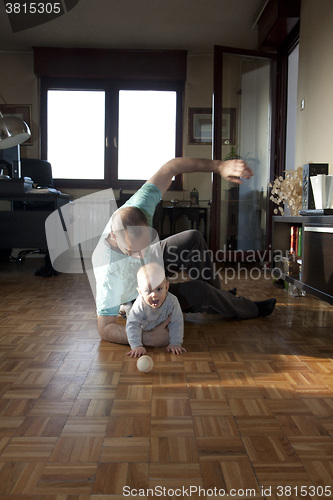 Image of Baby girl with her father