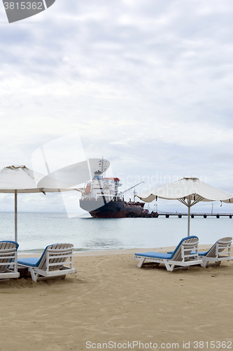 Image of oil tanker ship on Picnic Center Beach Big Corn Island Nicaragua