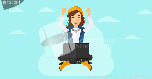 Image of Woman sitting on cloud with laptop.