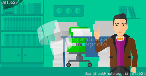 Image of Businessman pointing up with his forefinger.