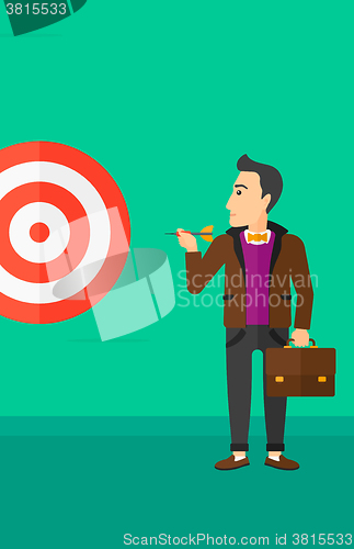 Image of Businessman with target board.