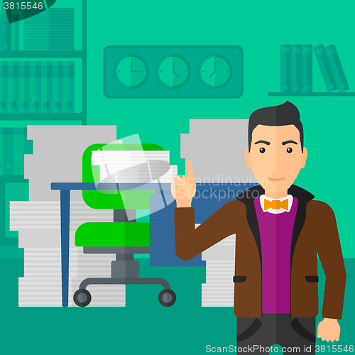 Image of Businessman pointing up with his forefinger.