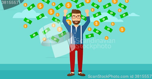 Image of Happy man with  flying money. 