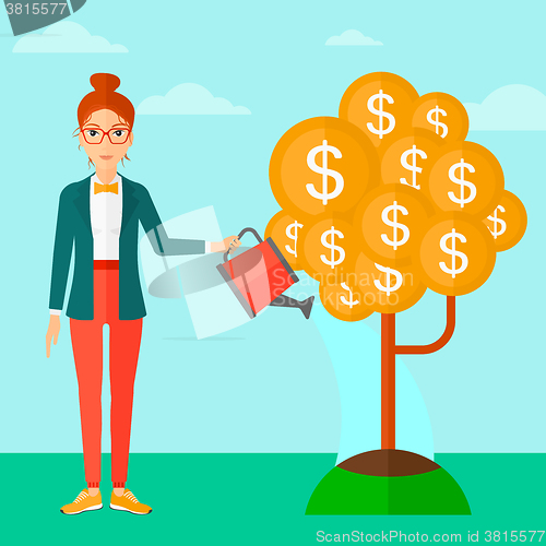 Image of Woman watering money tree.