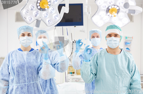 Image of group of surgeons in operating room at hospital