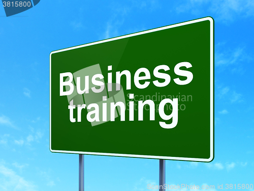 Image of Studying concept: Business Training on road sign background