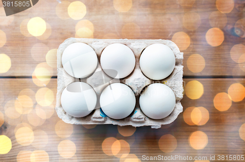 Image of close up of white eggs in egg box or carton