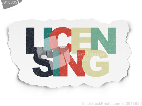 Image of Law concept: Licensing on Torn Paper background