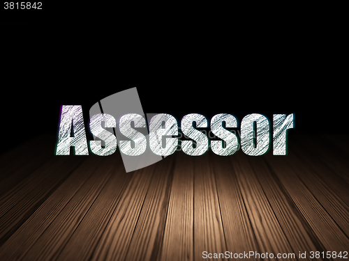 Image of Insurance concept: Assessor in grunge dark room