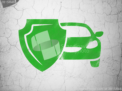 Image of Insurance concept: Car And Shield on wall background