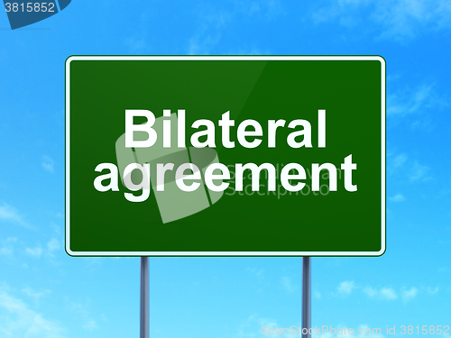 Image of Insurance concept: Bilateral Agreement on road sign background