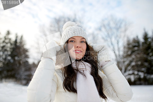 Image of happy woman outdoors in winter