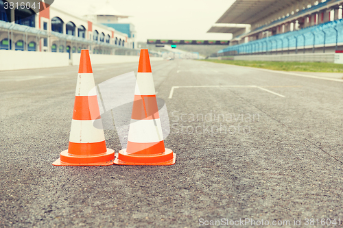 Image of traffic cones on speedway of stadium