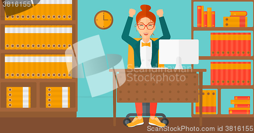 Image of Woman working at office.