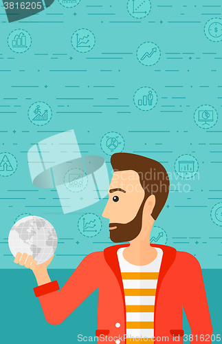 Image of Man holding globe.