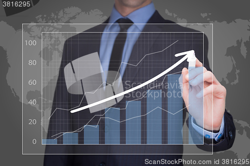 Image of businessman drawing  graph, business strategy as concept
