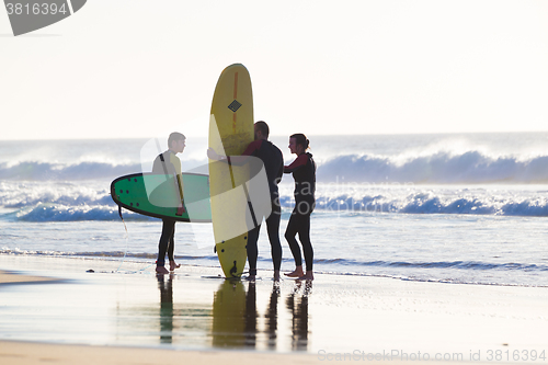 Image of Surfers surfing on El Cotillo beach, Fuerteventura, Canary Islands, Spain.