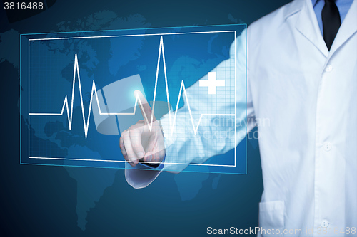 Image of doctor touching glow heartbeat line