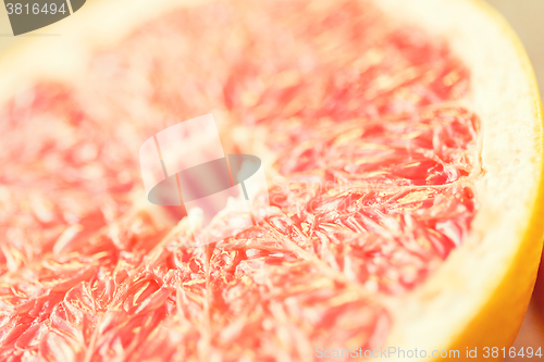 Image of close up of fresh juicy grapefruit slice