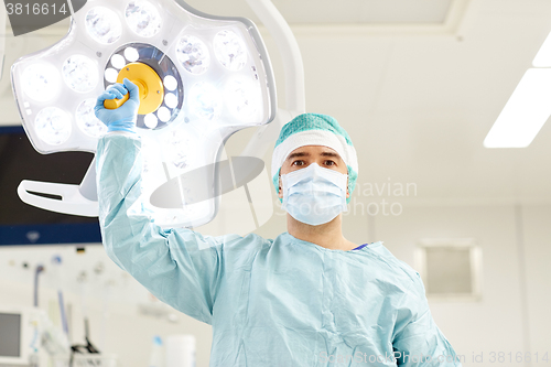 Image of surgeon in operating room at hospital