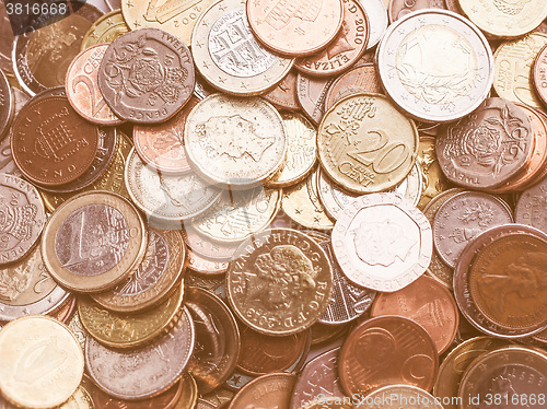 Image of  Euro and Pounds coins vintage