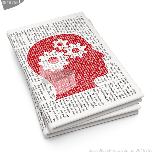 Image of Learning concept: Head With Gears on Newspaper background