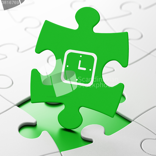 Image of Time concept: Watch on puzzle background