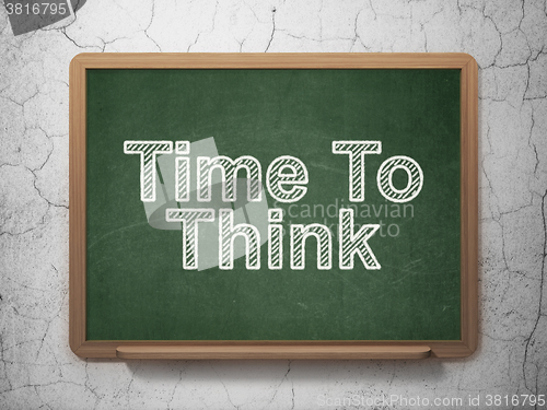 Image of Time concept: Time To Think on chalkboard background